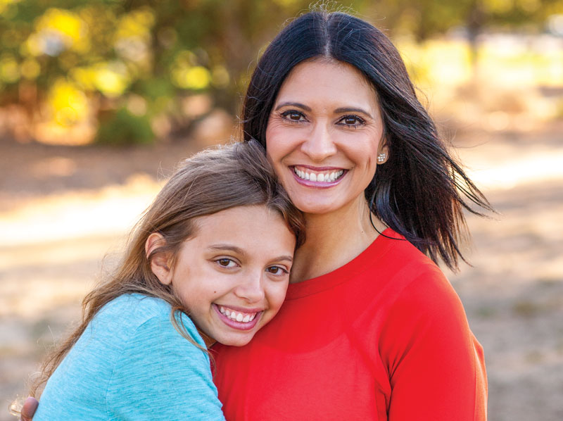 smiling mother daughter