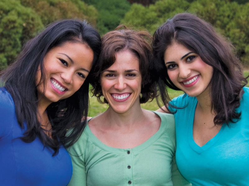 three smiling women